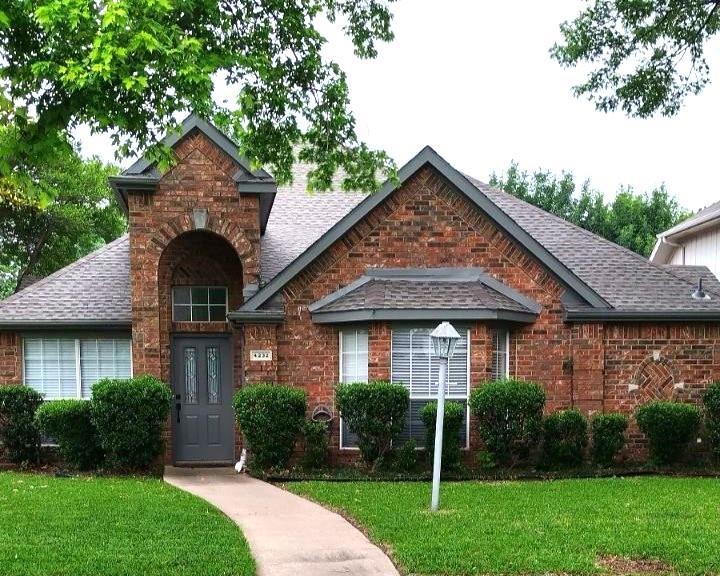 4232 Briarbend Road Dallas, TX 75287 - Photo 19 of 20 a front view of a house with a yard