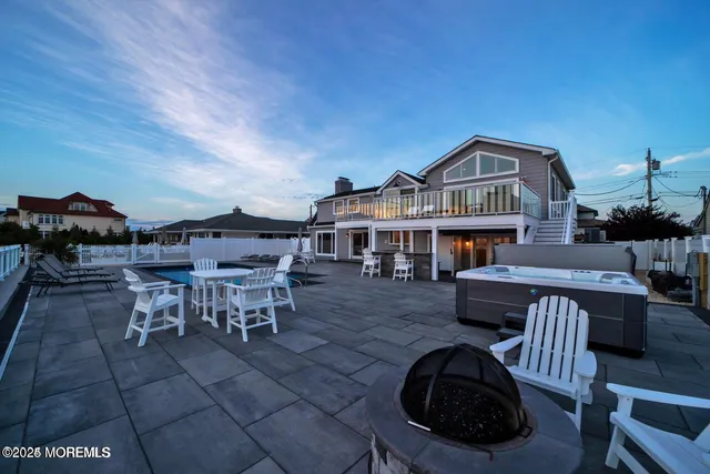 a bedroom with a bed and a night stand