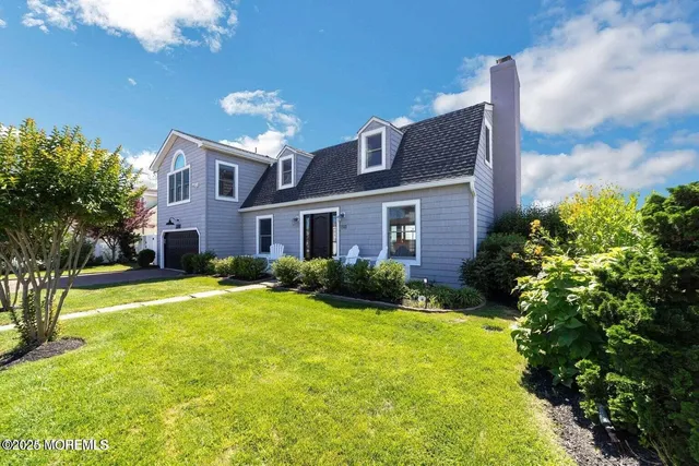 a bedroom with a bed and a fireplace