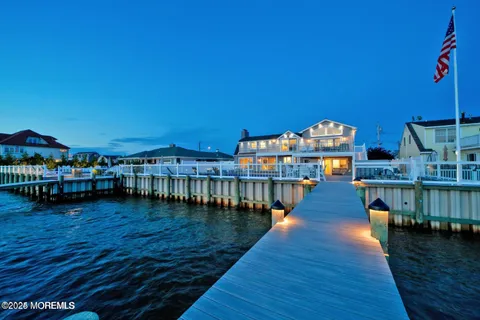 a bathroom with a sink a toilet and vanity