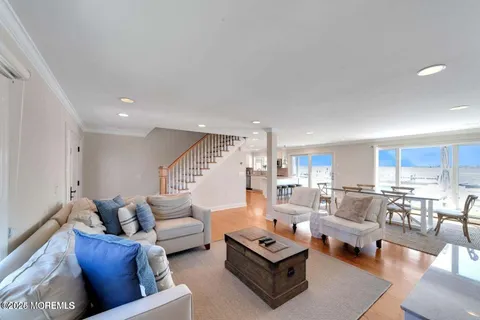 an aerial view of a house with a lake view