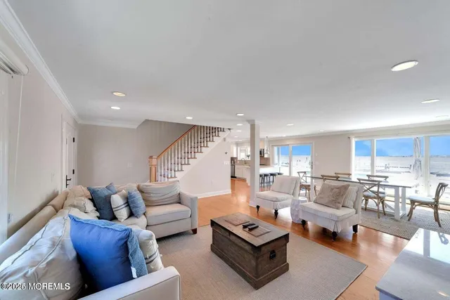 an aerial view of a house with a lake view