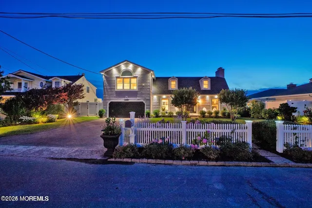 a room with lots of wooden furniture and a table