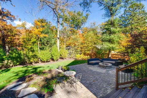 a backyard of a house with lots of green space