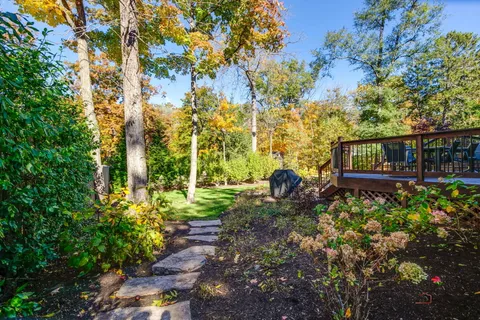 a backyard of a house with lots of green space