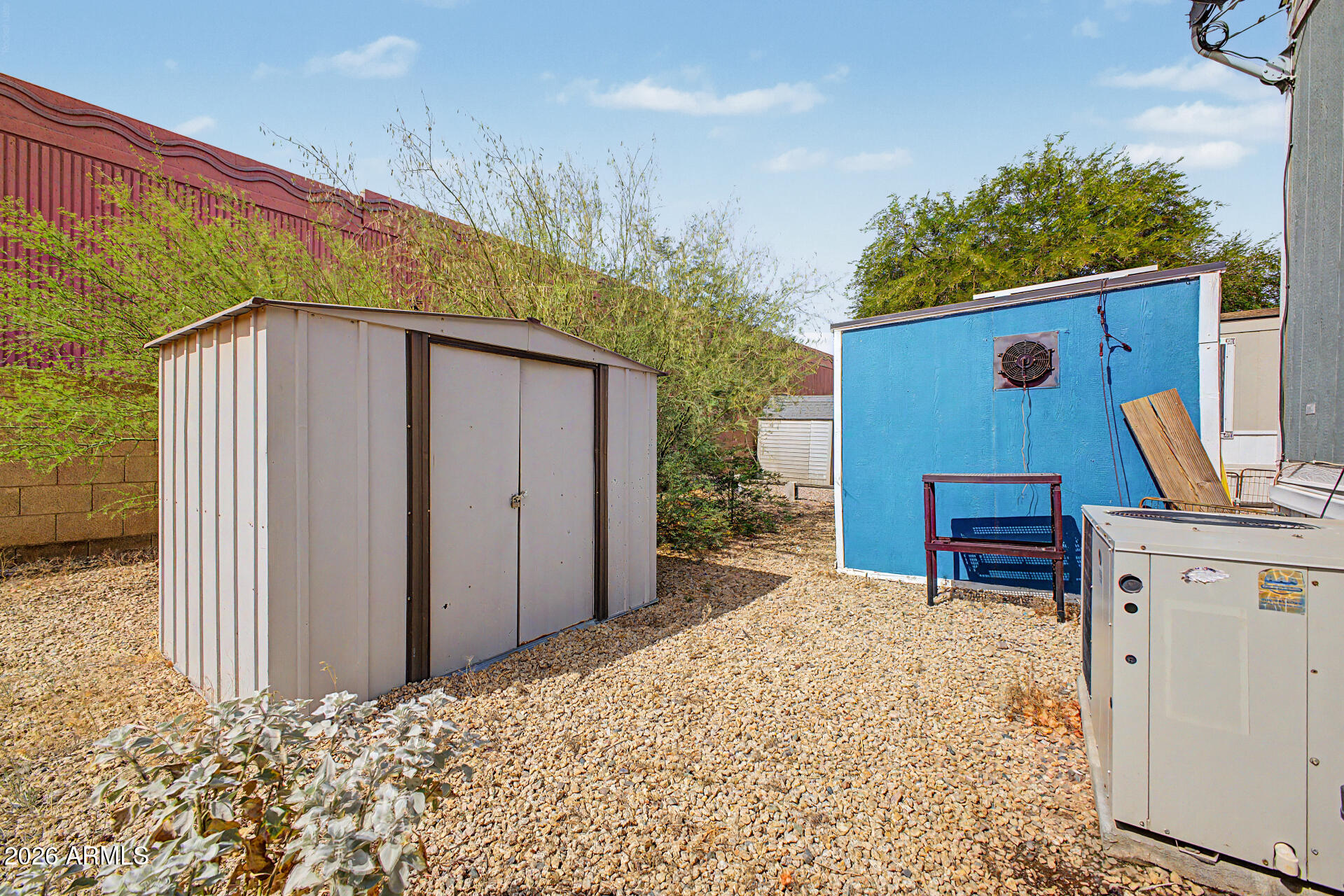 625 West McKellips Road, Unit 55 Mesa, AZ 85201 - Photo 17 of 21 a backyard of a house