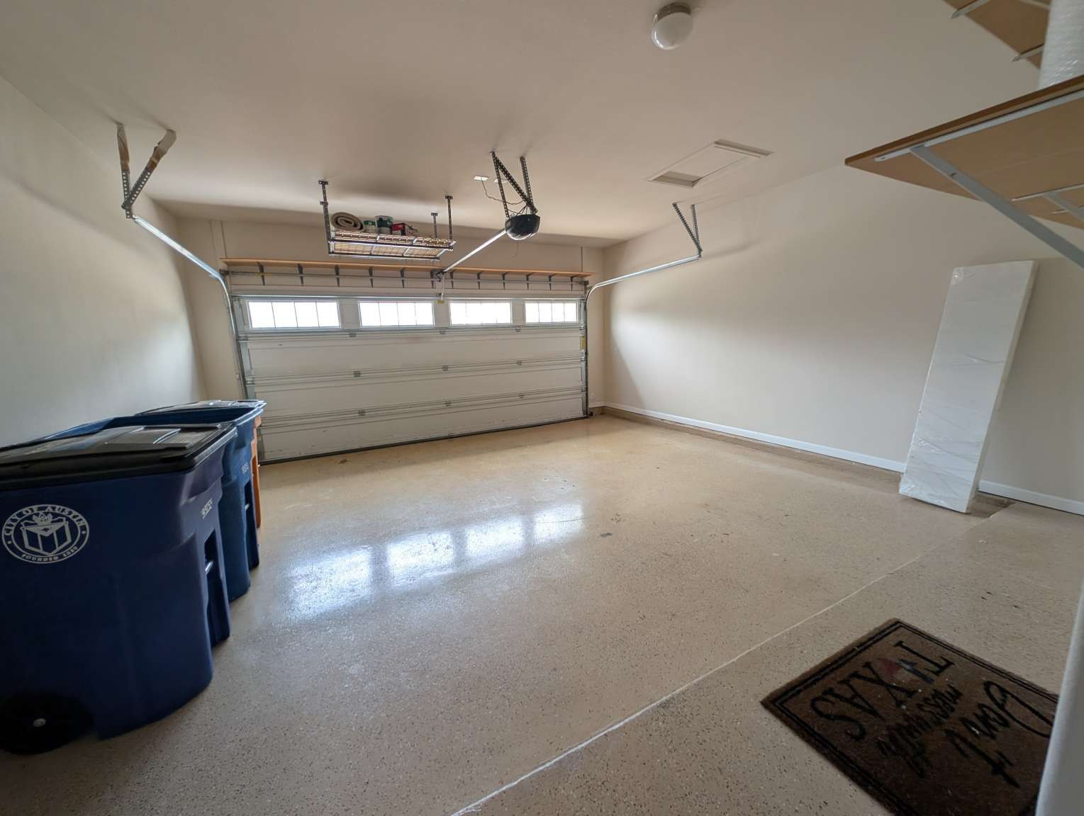 7301 Bandera Ranch Trail, Unit A Austin, TX 78750 - Photo 8 of 20 A spacious and practical garage awaits your vehicles and storage needs.