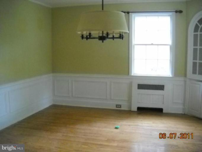 5802 Kenmore Road Baltimore, MD 21210 - Photo 2 of 5 a view of storage and utility room with a window