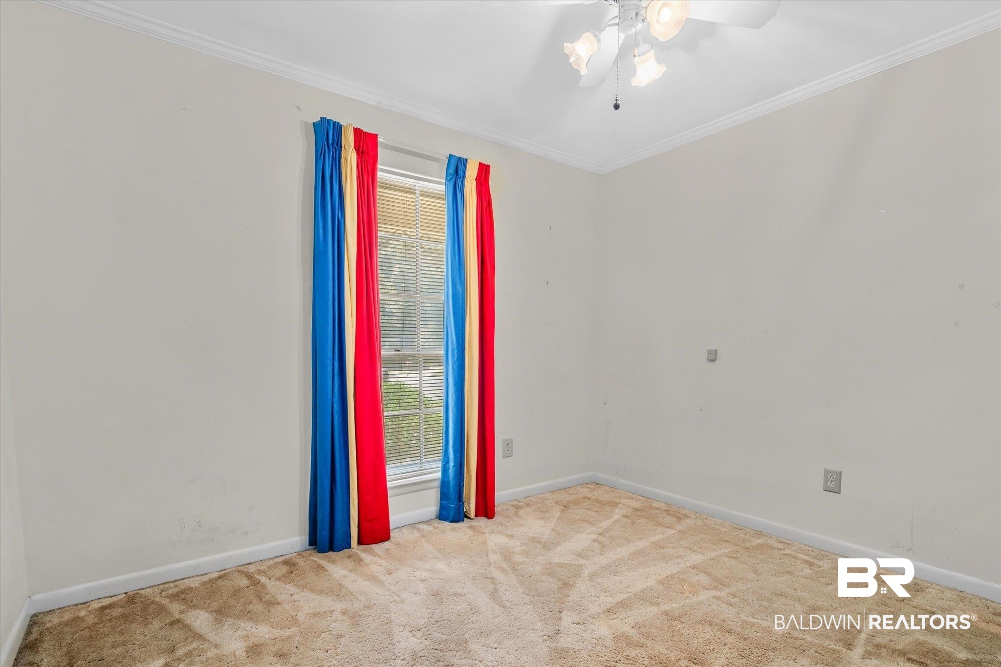 5608 Judson Circle Mobile, AL 36608 - Photo 12 of 20 Carpeted empty room featuring ornamental molding and ceiling fan