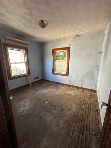 an empty room with windows