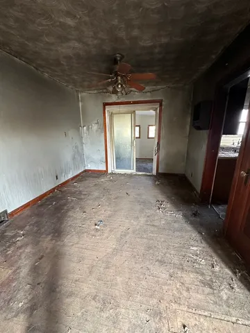 a view of a hallway with a window