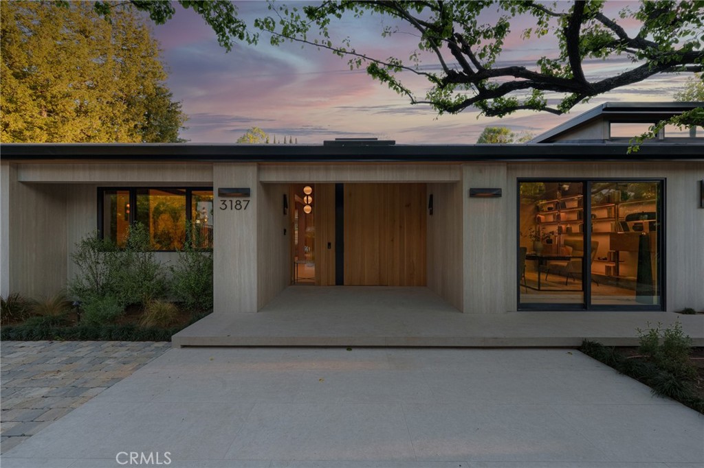 3187 Oakdell Road Studio City, CA 91604 - Photo 2 of 63 a front view of a house with a yard