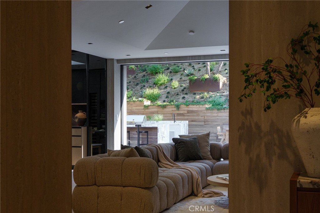 3187 Oakdell Road Studio City, CA 91604 - Photo 21 of 63 a living room with furniture and a large window