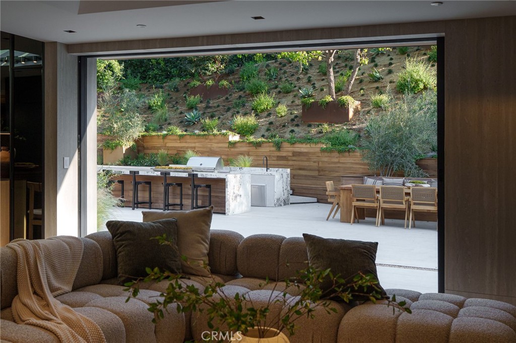 3187 Oakdell Road Studio City, CA 91604 - Photo 22 of 63 a living room with furniture and a large window
