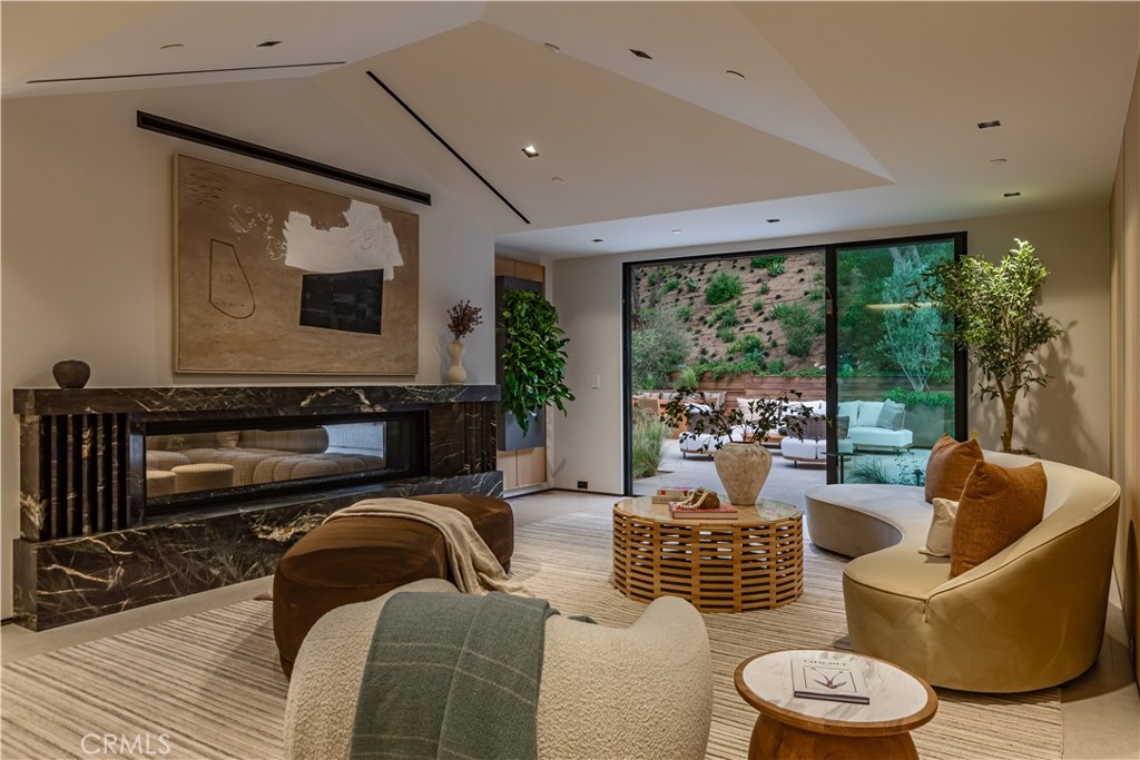 3187 Oakdell Road Studio City, CA 91604 - Photo 26 of 63 a living room with furniture and a large window