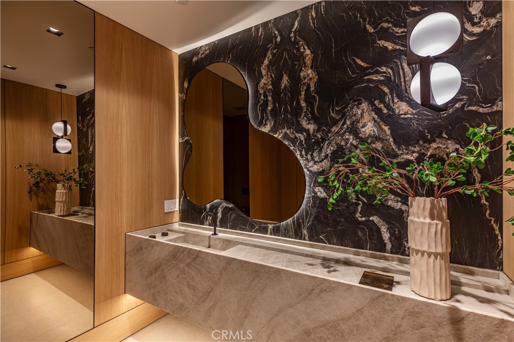 3187 Oakdell Road Studio City, CA 91604 - Photo 27 of 63 a bathroom with a sink and a mirror