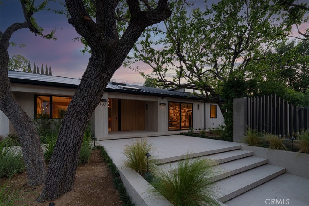 3187 Oakdell Road Studio City, CA 91604 - Photo 4 of 63 a front view of a house with a yard