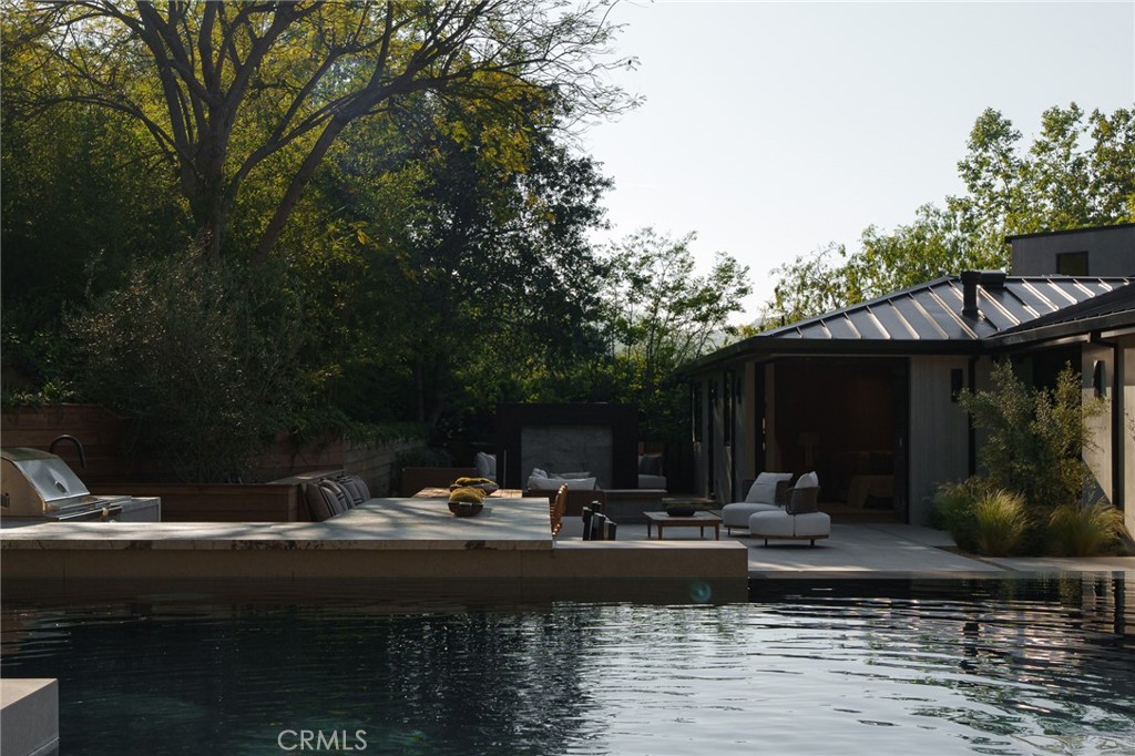3187 Oakdell Road Studio City, CA 91604 - Photo 52 of 63 a view of house with swimming pool and outdoor seating