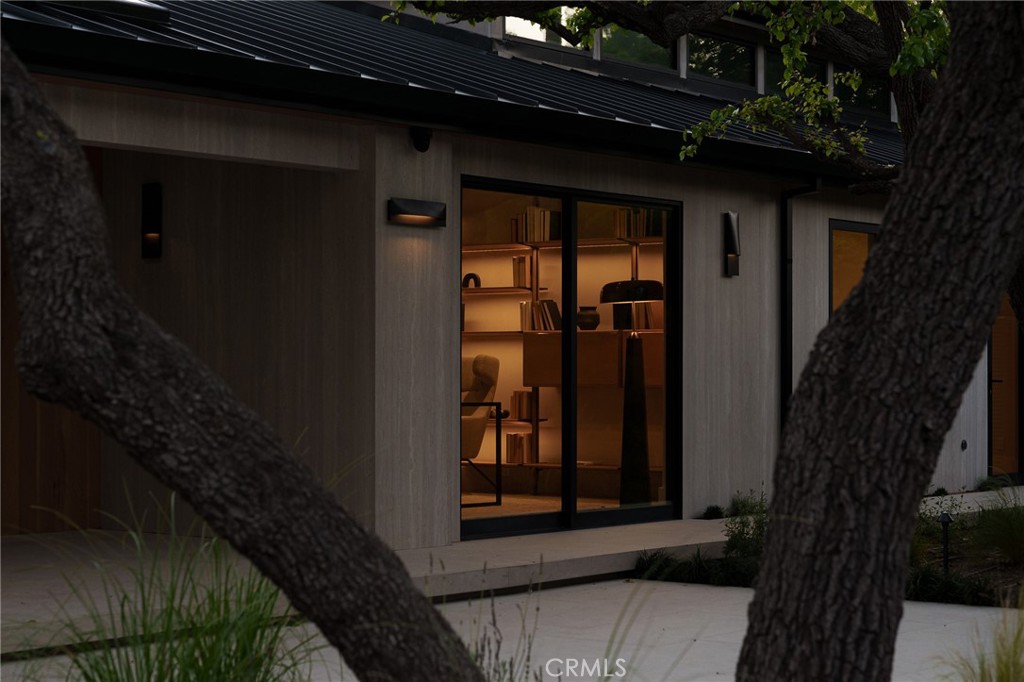 3187 Oakdell Road Studio City, CA 91604 - Photo 7 of 63 a front view of a house with a yard