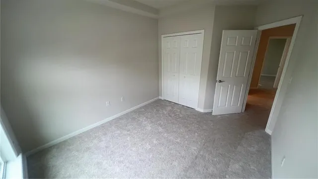 a view of livingroom and a window