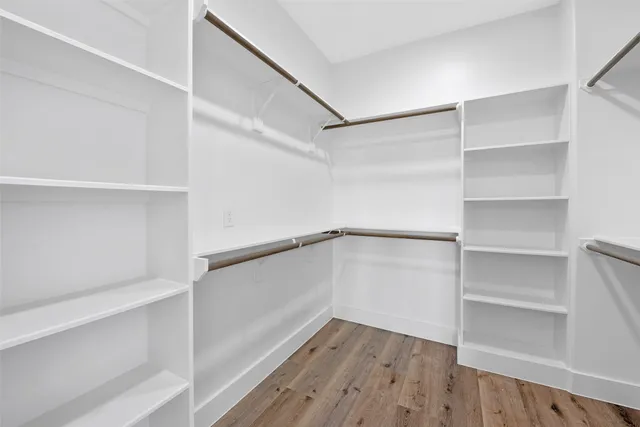 a view of an empty walk in closet