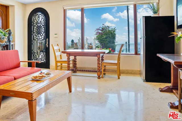 a outdoor living space with furniture and a potted plant
