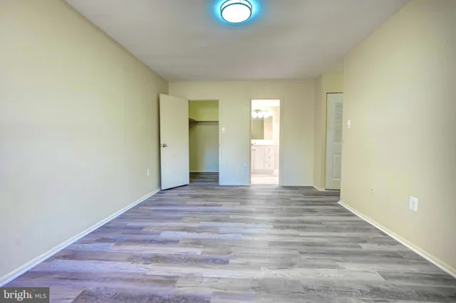 a view of an empty walk in closet