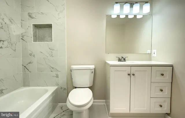 a view of a room with a large window