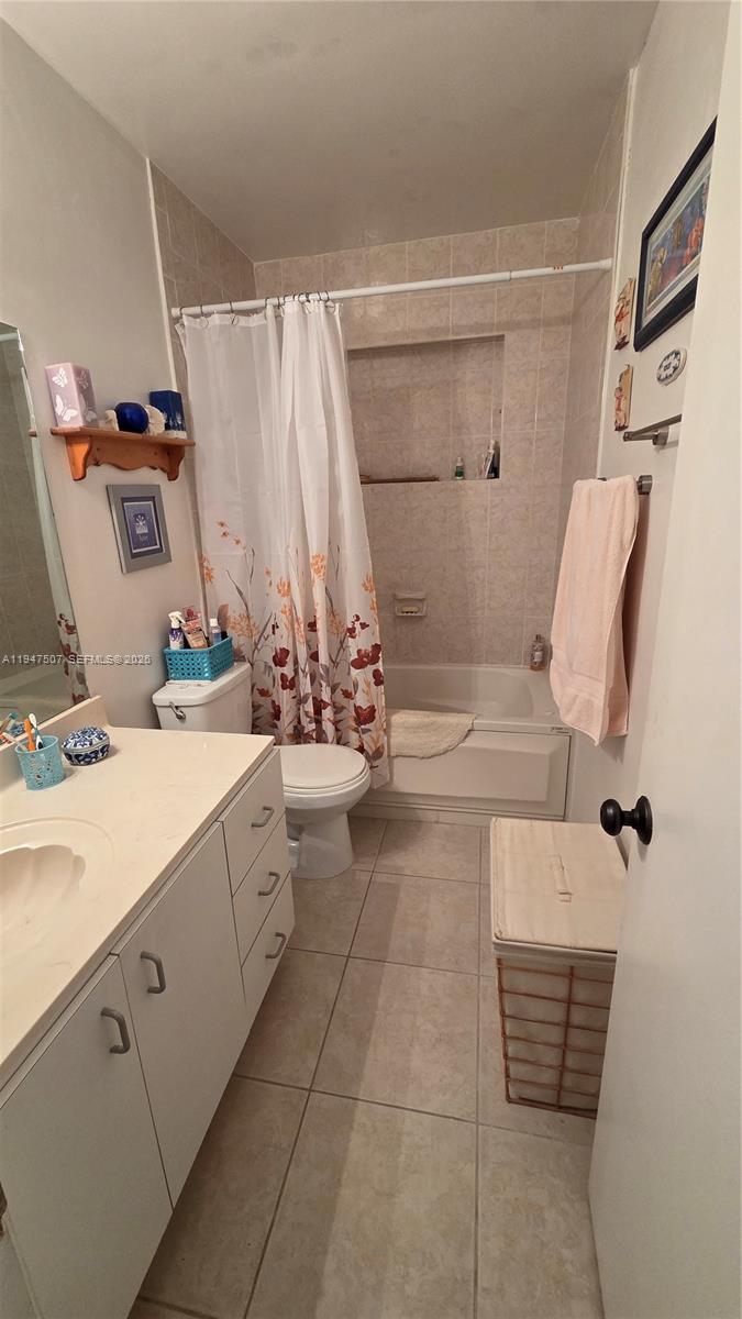11933 Southwest 196th Terrace Miami, FL 33177 - Photo 17 of 29 a bathroom with a sink and a mirror