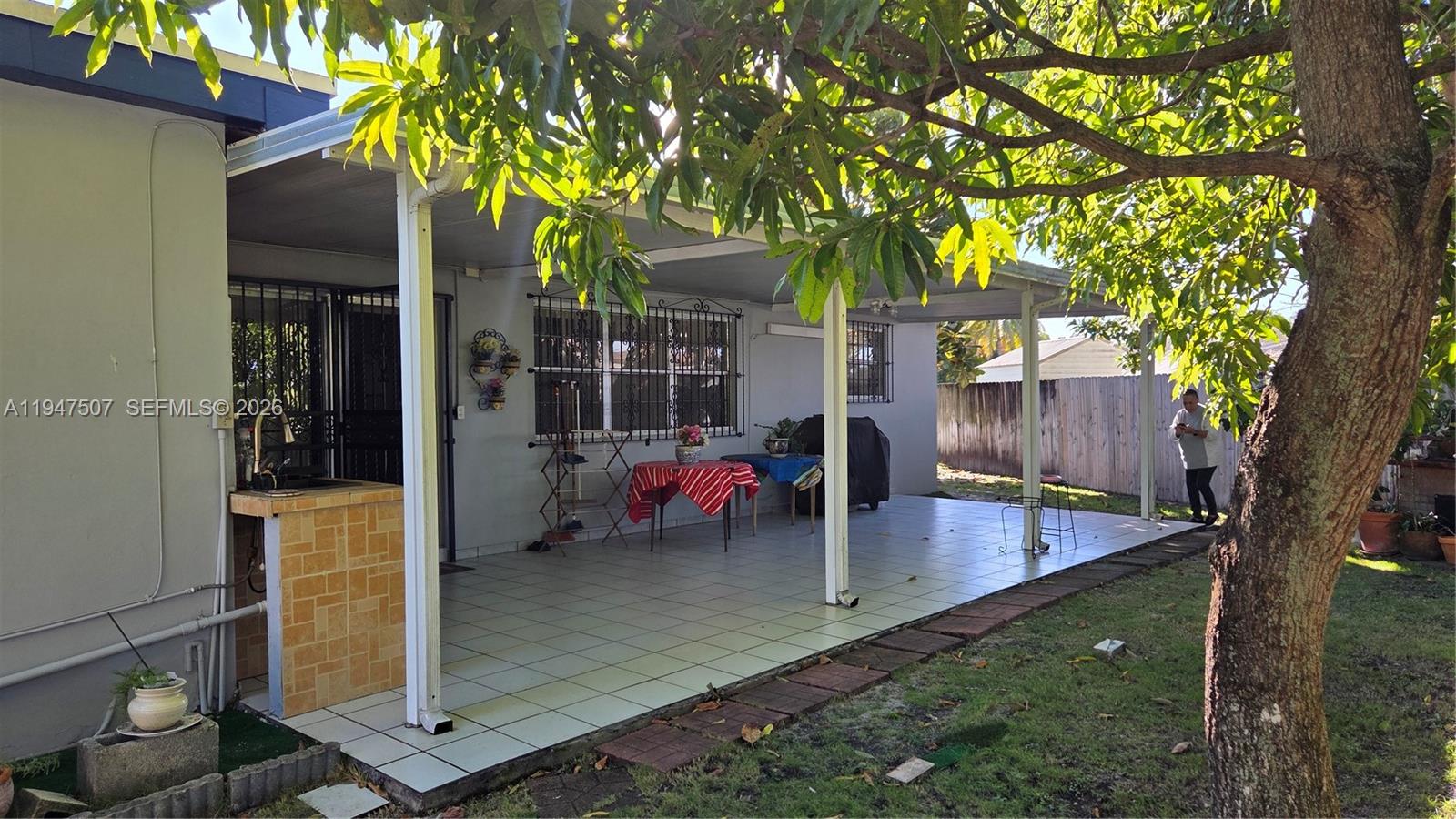 11933 Southwest 196th Terrace Miami, FL 33177 - Photo 26 of 29 swimming pool view with a outdoor seating