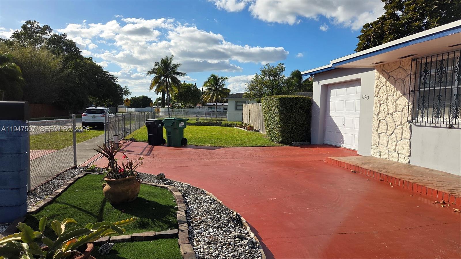 11933 Southwest 196th Terrace Miami, FL 33177 - Photo 4 of 29 a view of a backyard with swimming pool