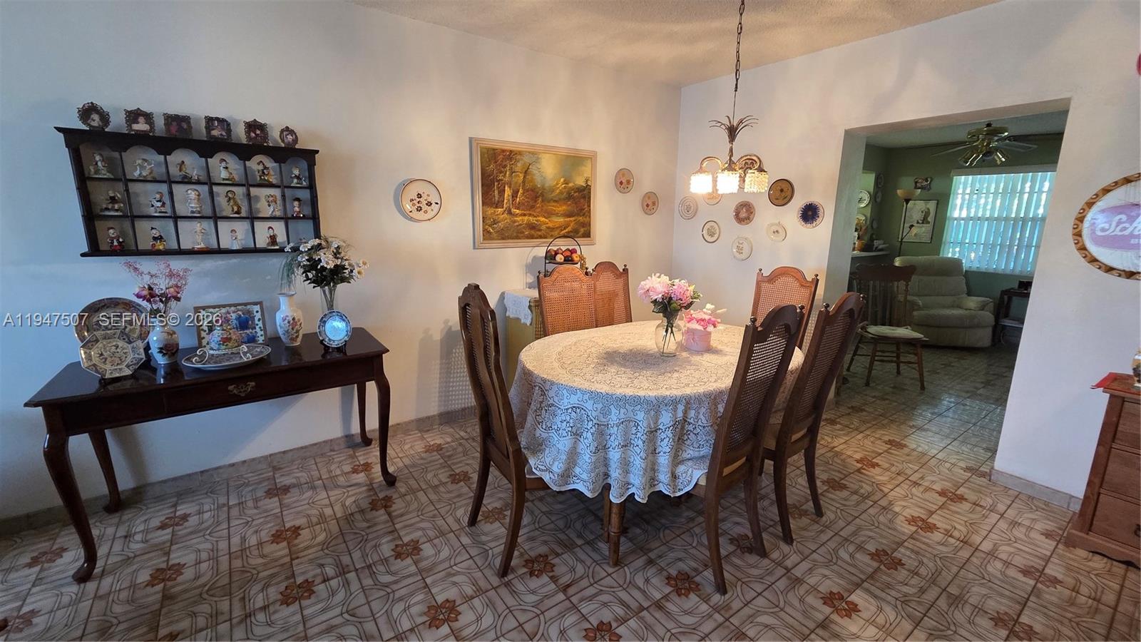 11933 Southwest 196th Terrace Miami, FL 33177 - Photo 9 of 29 a dining room with furniture and window