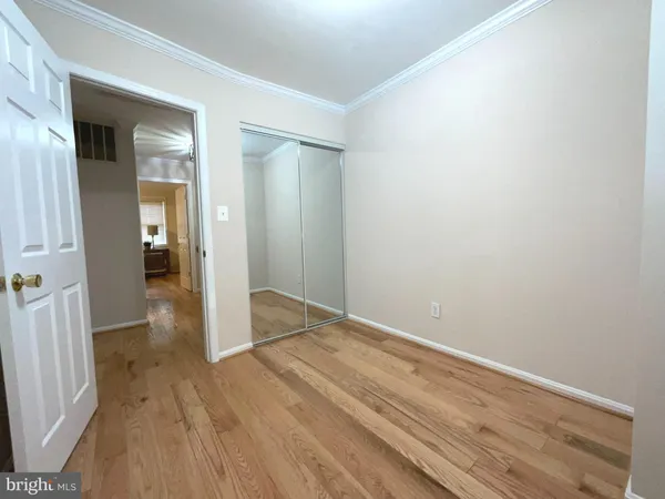 a view of a house with wooden deck