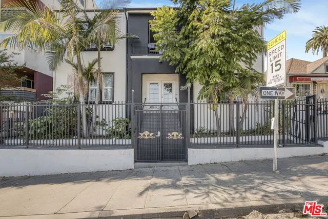 a view of a entrance gate of a house