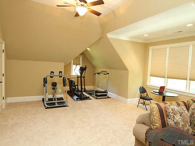 6828 Mactavish Way Raleigh, NC 27613 - Photo 16 of 25 a room with gym equipment