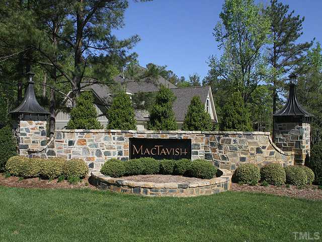 6828 Mactavish Way Raleigh, NC 27613 - Photo 25 of 25 a view of house with garden space and trees