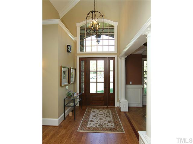 6828 Mactavish Way Raleigh, NC 27613 - Photo 3 of 25 a view of entryway with wooden floor