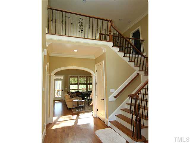 6828 Mactavish Way Raleigh, NC 27613 - Photo 4 of 25 a view of entryway livingroom and hall