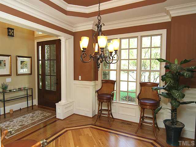 6828 Mactavish Way Raleigh, NC 27613 - Photo 8 of 25 a living room with furniture and a window