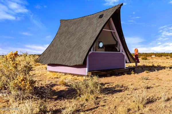 a house view with a garden space