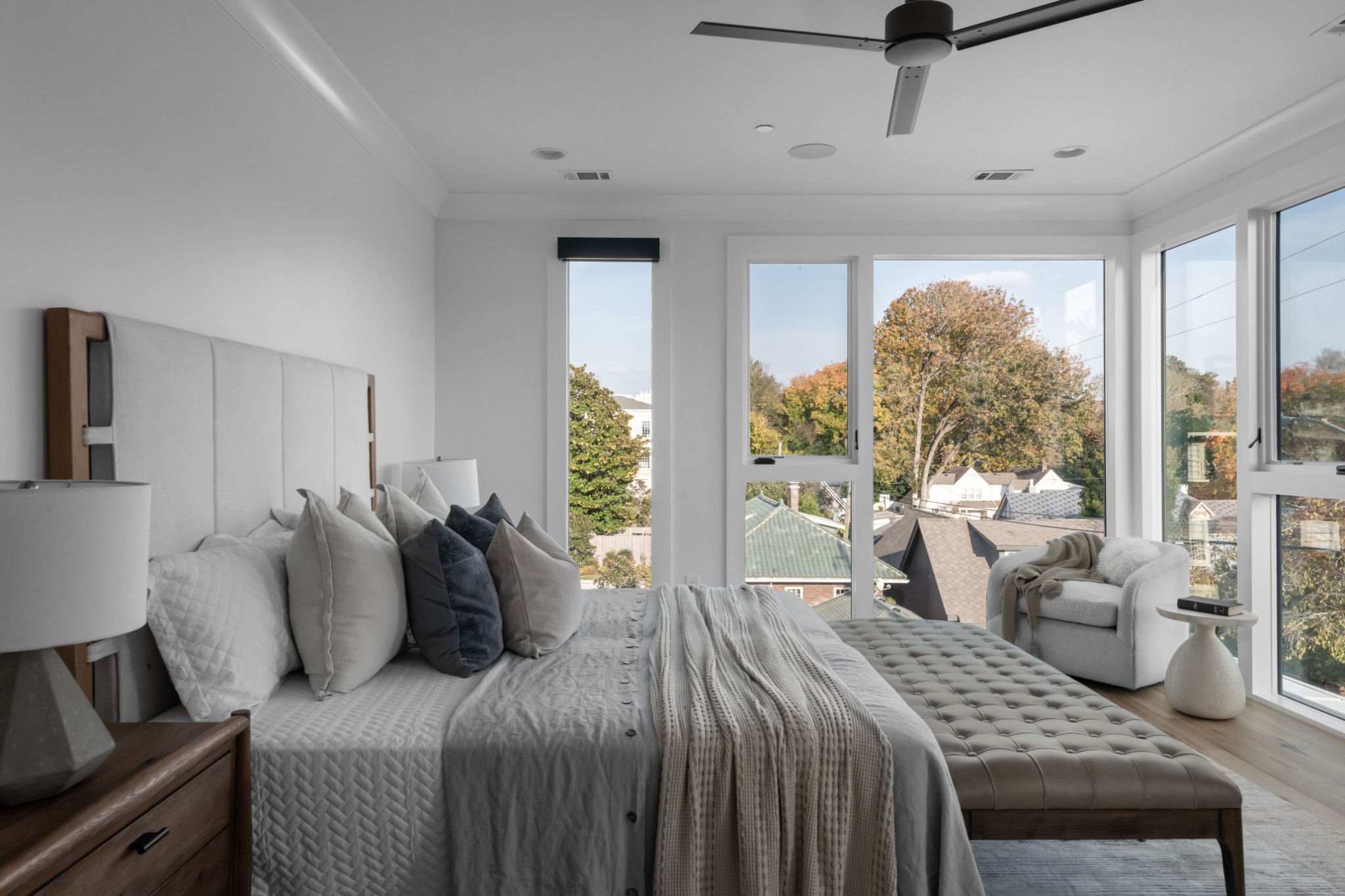 95 Leonard Avenue, Unit 8 Nashville, TN 37205 - Photo 20 of 36 a bedroom with a bed and a couch