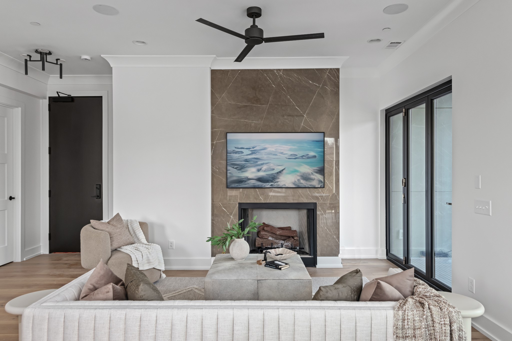 95 Leonard Avenue, Unit 8 Nashville, TN 37205 - Photo 2 of 36 a view of a livingroom with furniture and a fireplace