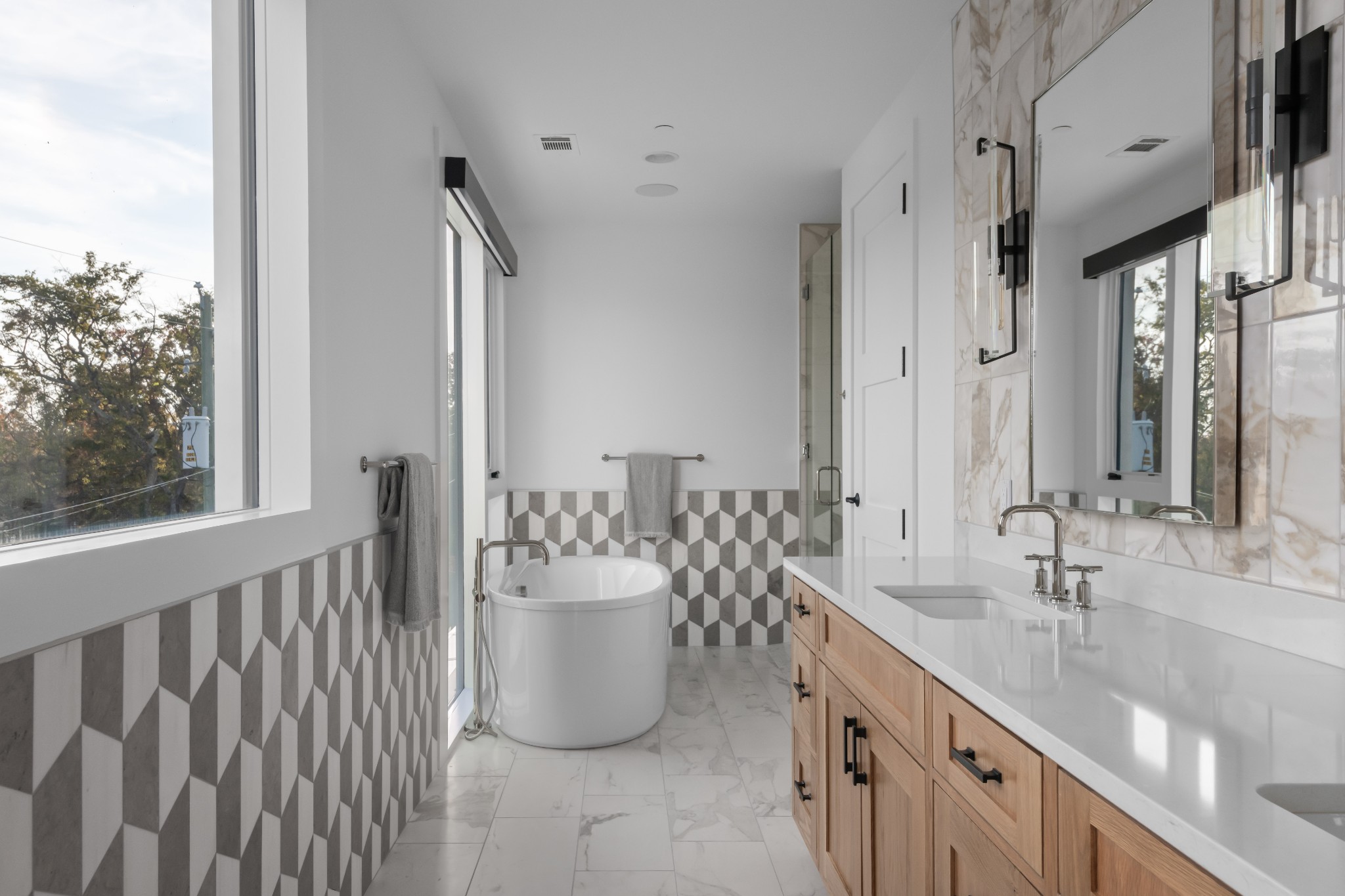 95 Leonard Avenue, Unit 8 Nashville, TN 37205 - Photo 24 of 36 a spacious bathroom with a double vanity sink and a mirror
