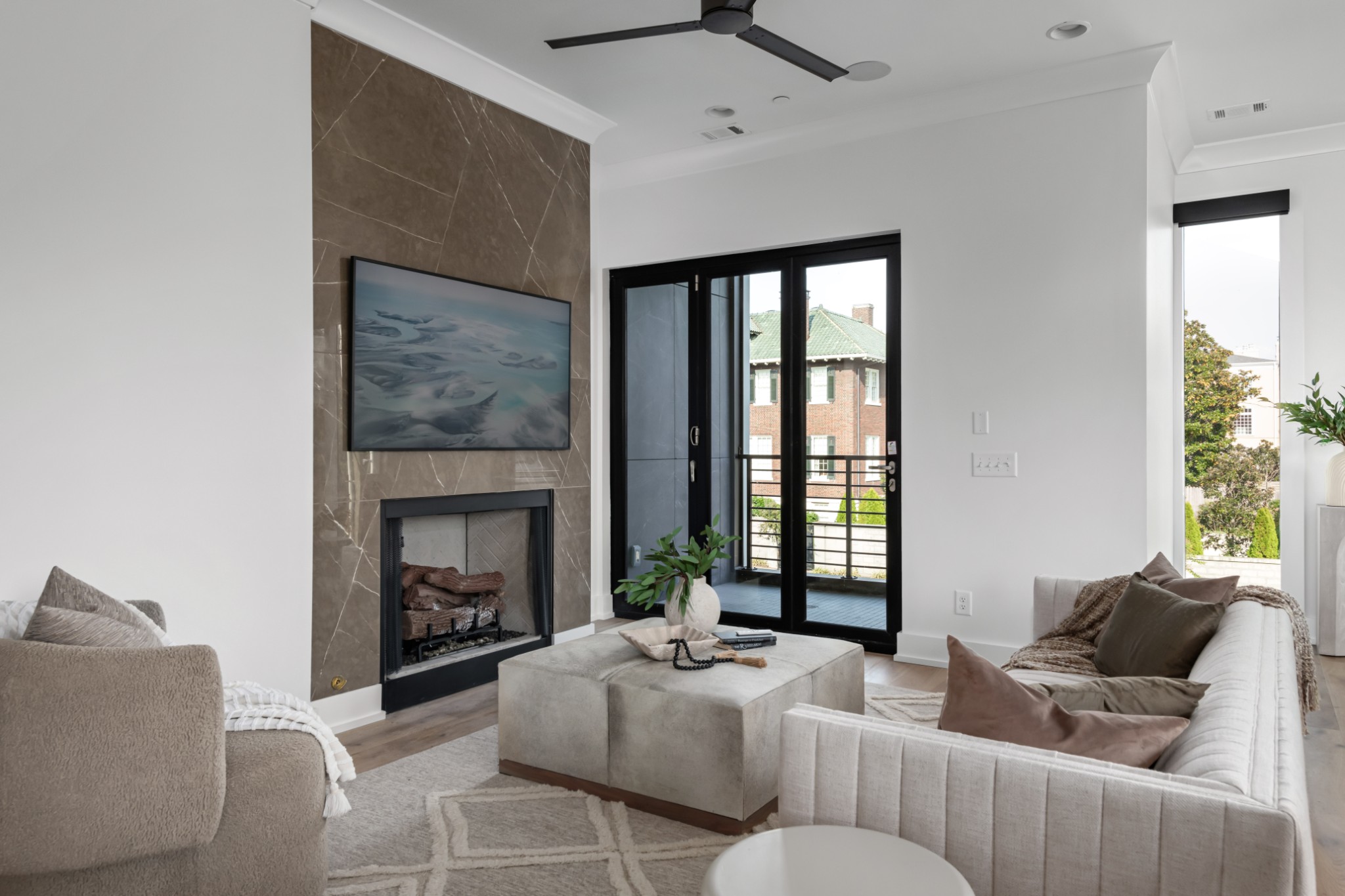 95 Leonard Avenue, Unit 8 Nashville, TN 37205 - Photo 36 of 36 a living room with furniture a fireplace and a large window