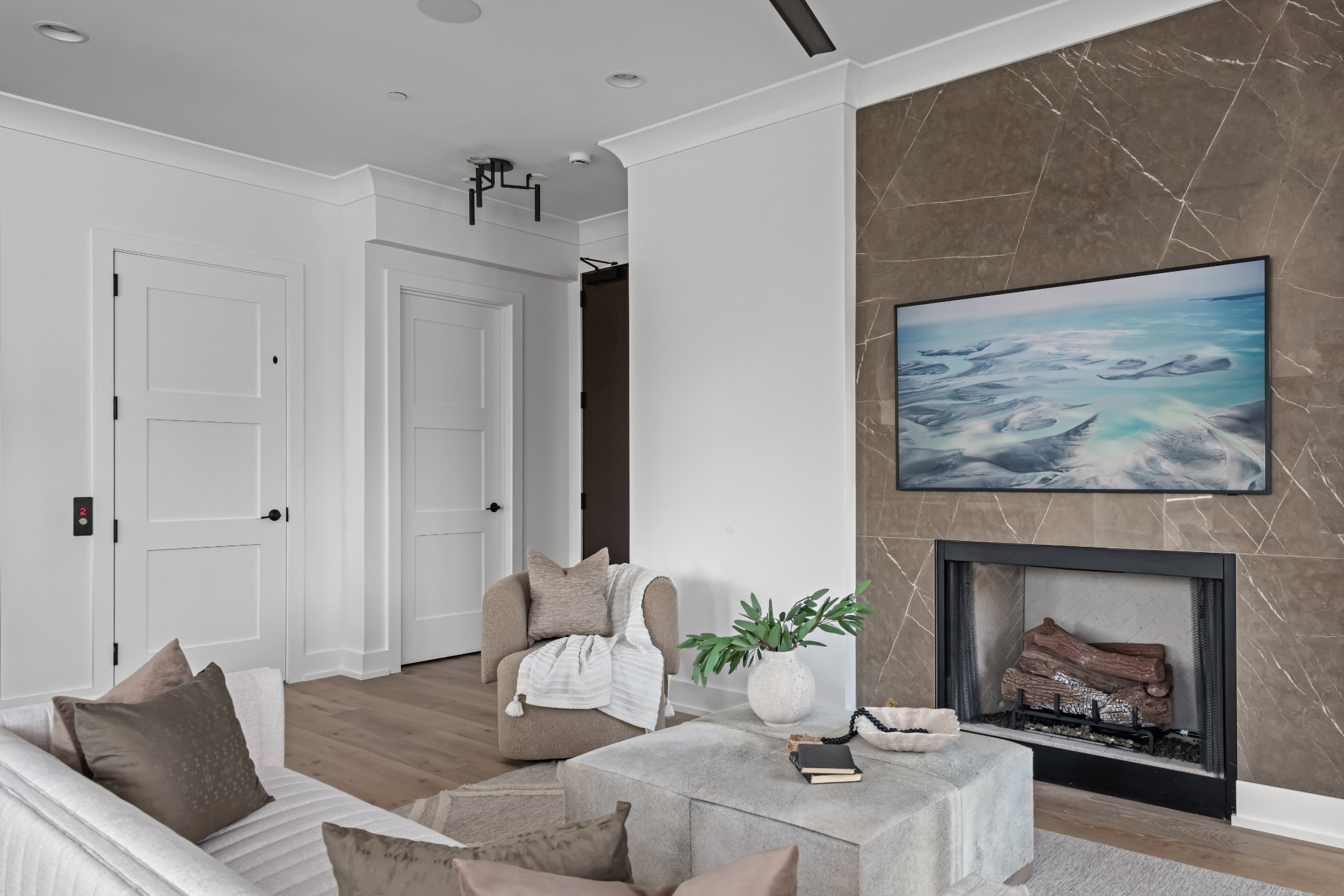 95 Leonard Avenue, Unit 8 Nashville, TN 37205 - Photo 4 of 36 a living room with furniture and a fireplace