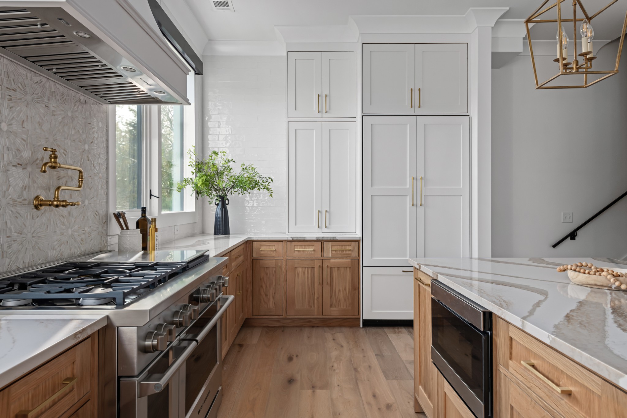 95 Leonard Avenue, Unit 8 Nashville, TN 37205 - Photo 9 of 36 a kitchen with granite countertop a sink stove and cabinets