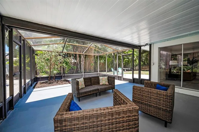 a view of a backyard with porch