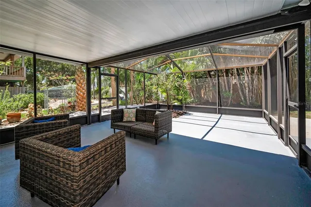 a view of an chairs and tables in the patio