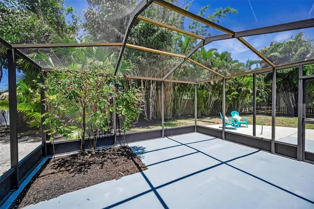 a backyard of a house with lots of green space