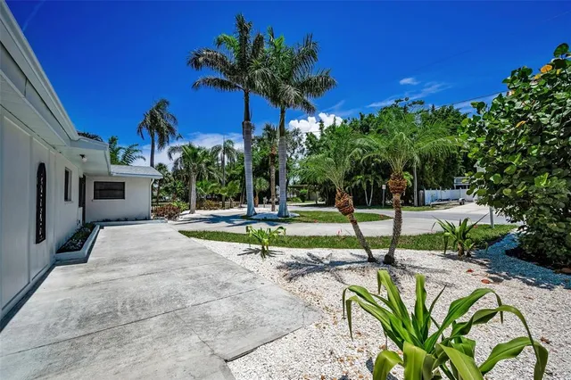 a house view with a backyard space